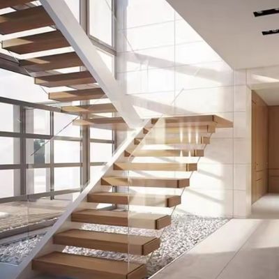 Villa de diseño de escalera flotante de acero invisible con barandilla de vidrio de tramo de madera