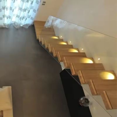 Villa de diseño de escalera flotante de acero invisible con barandilla de vidrio de tramo de madera