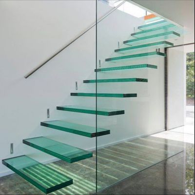 Escalera flotante moderna para interiores o exteriores con barandillas y pisos personalizados para edificios comerciales