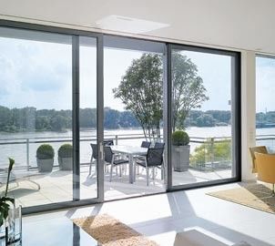 Puerta corredera residencial de aluminio con método de apertura de empuje y tira y vidrio doble templado