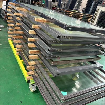 Puerta de vidrio transparente de doble acristalamiento de trabajo pesado aislada térmicamente Puerta doble plegable